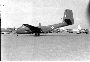 RAAF Caribou with USA C-130 Hercules in the background