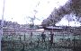US Army "Bandit" Huey Gunship on fire at front of 547 Sig Tp compound 