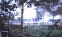 US Army "Bandit" Huey Gunship on fire at front of 547 Sig Tp compound 